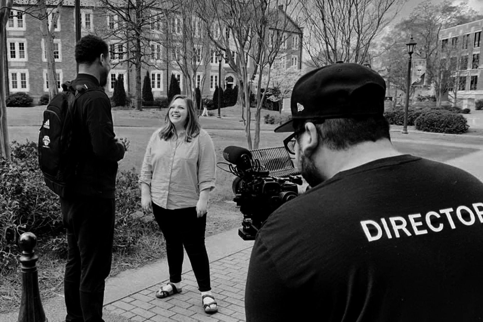 Photo and video crew covering a corporate production together