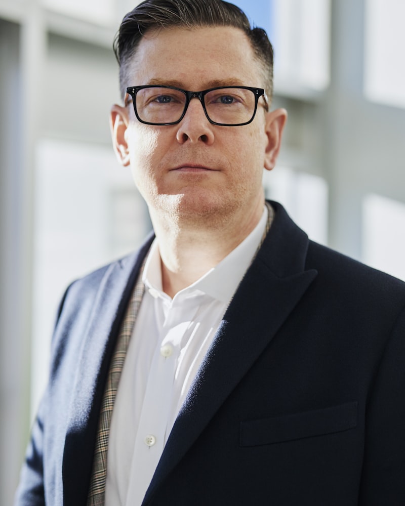 Professional corporate headshot of an executive taken by an on-site headshot photographer