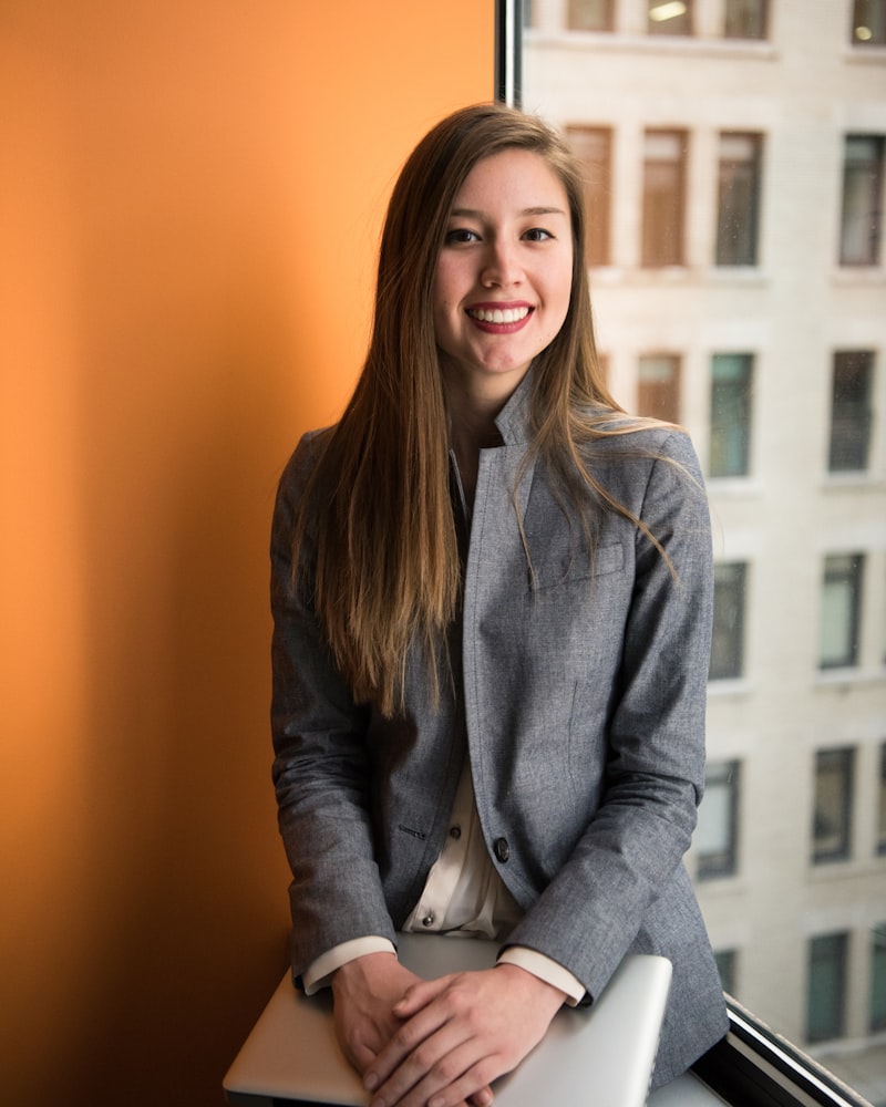 Consistent professional team headshot matching company branding from a mobile headshot studio